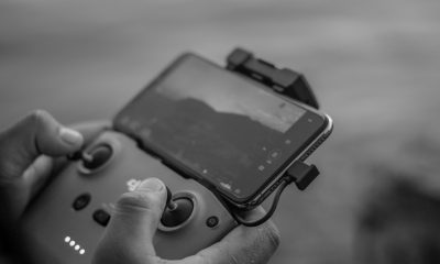 Smartphone connected to a controller-extension for mobile gaming